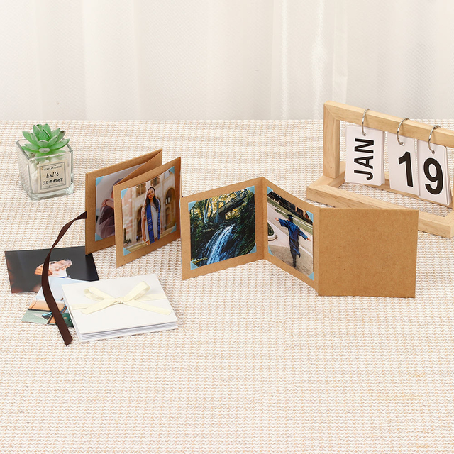 Logotipo personalizado Allum de fotos de acordeón plegable al por mayor Kraft Paper Ribbon Knot Memory Postal para graduación Cumpleaños Familia