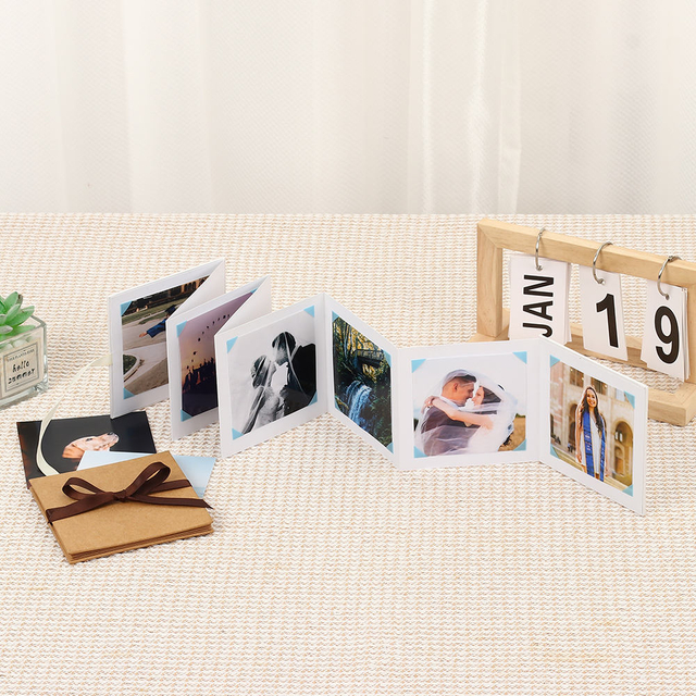 Logotipo personalizado al por mayor Kraft Paper plegable Coracion Foto Álbum de fotos Ribbon Knot Memory Postal para graduación Cumpleaños Familia de bebé