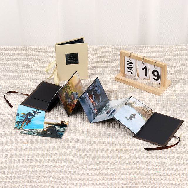 Wholesales Personalizar logotipo 4x6 álbum de fotos plegable de papel settring con ventana graduación de cumpleaños de bodas