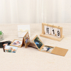 Logotipo personalizado al por mayor Kraft Paper Ribbon cumpleaños Baby Family Memory Postcard Book Knot Accordion Plegable Foto Álbum Graduación